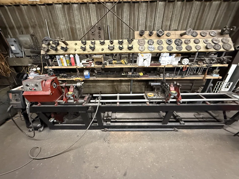 Driveshaft mounted on balancing equipment in the Schmelzle MechFab shop
