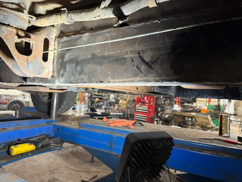 Fabricated steel replacement section fitted into an existing truck frame rail